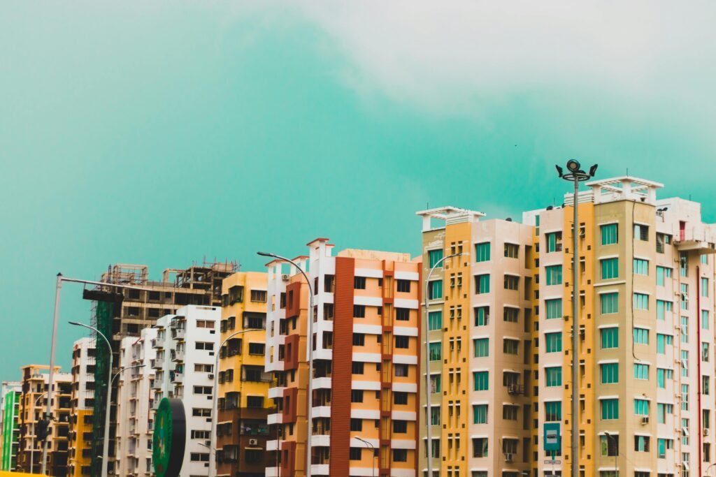 Assorted-color Buildings Under Green Sky